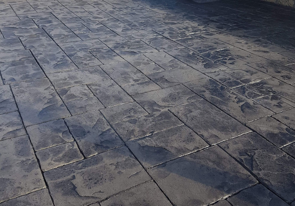Close up of the finished stamped concrete patio by Creative Man