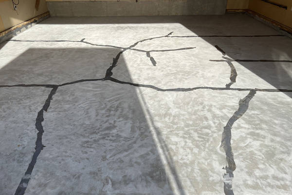 The original floor with cracks filled