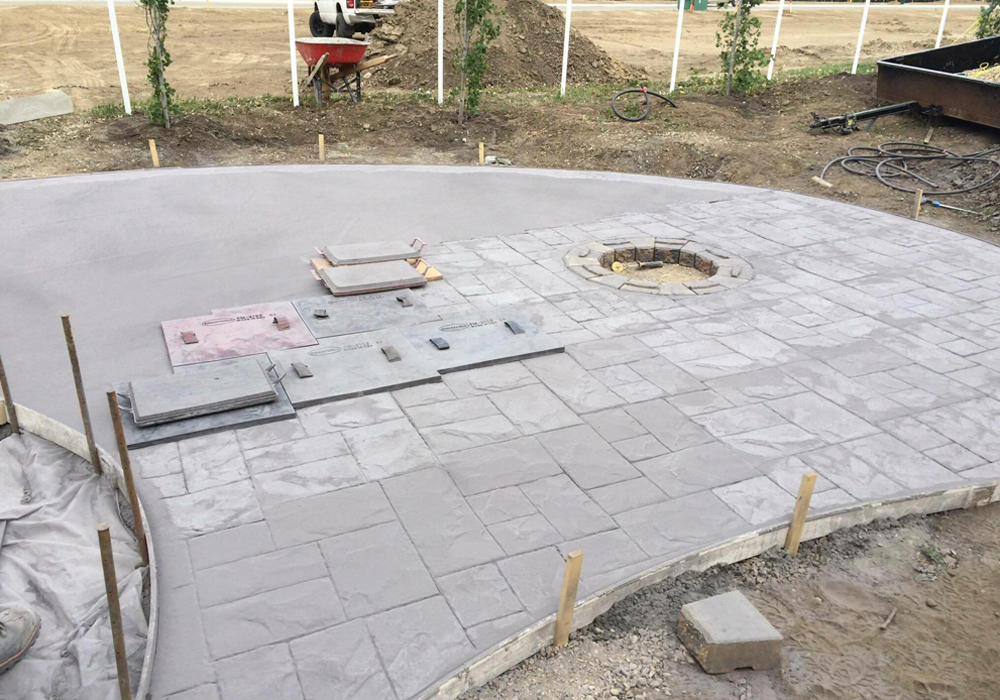 Stamped concrete patio in progress by Creative Man